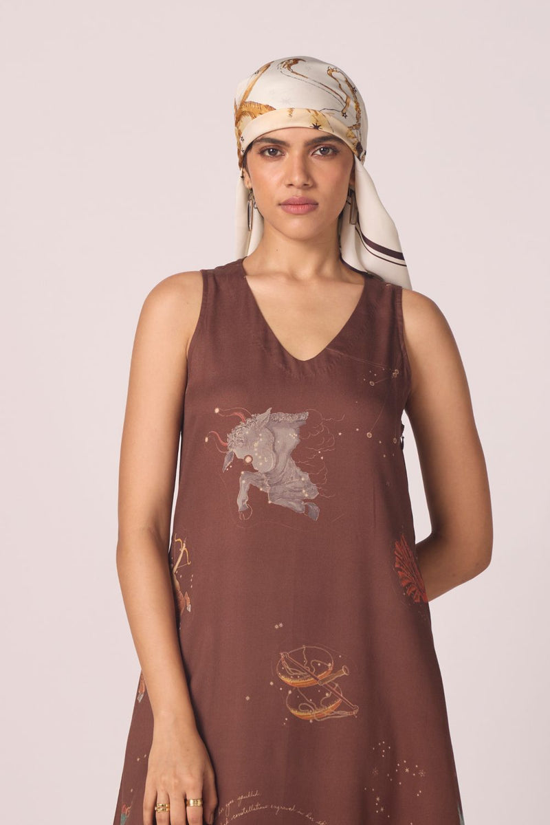 Saira Brown Zodiac Print Maxi Dress by The Summer House in brown color for women in Singapore