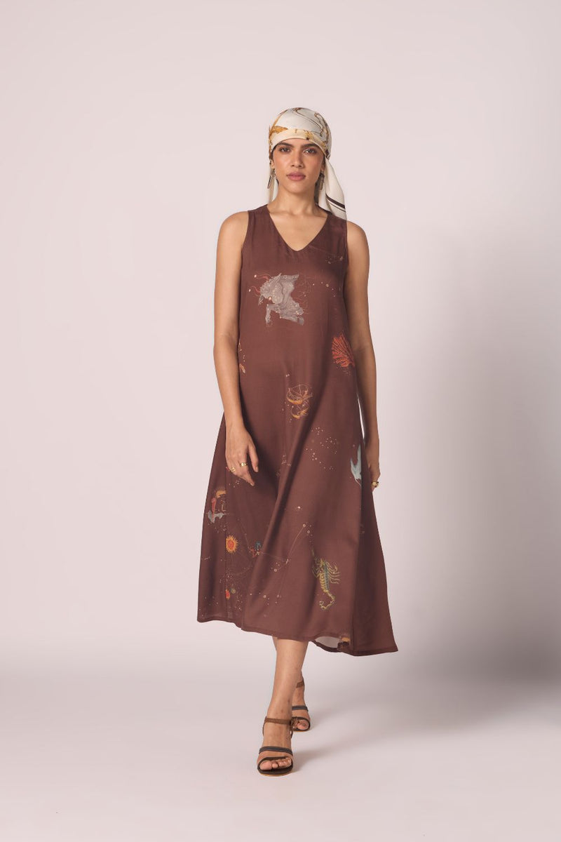 Saira Brown Zodiac Print Maxi Dress by The Summer House in brown color for women in Singapore