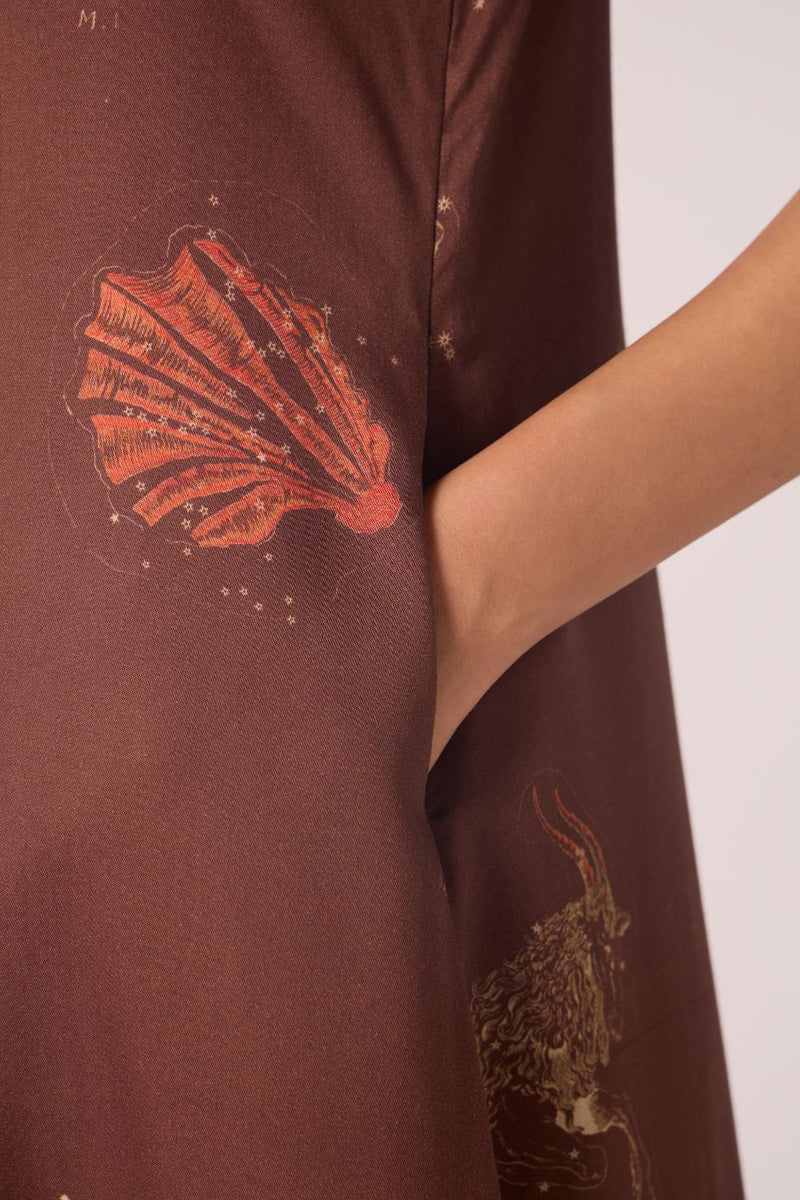 Saira Brown Zodiac Print Maxi Dress by The Summer House in brown color for women in Singapore