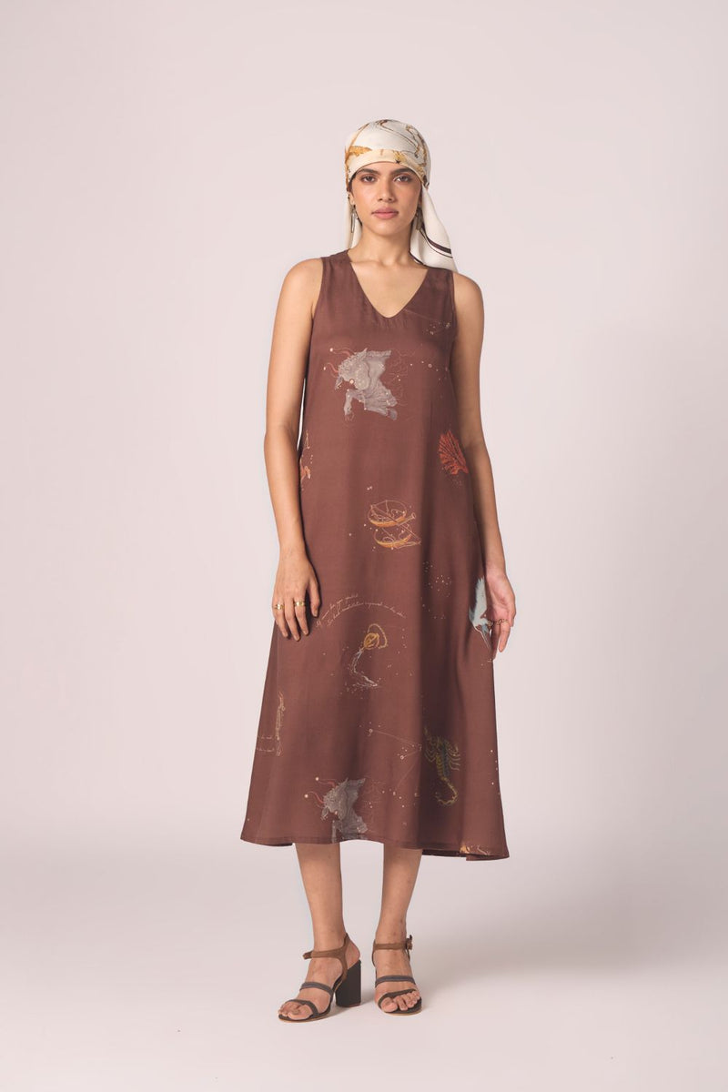 Saira Brown Zodiac Print Maxi Dress by The Summer House in brown color for women in Singapore