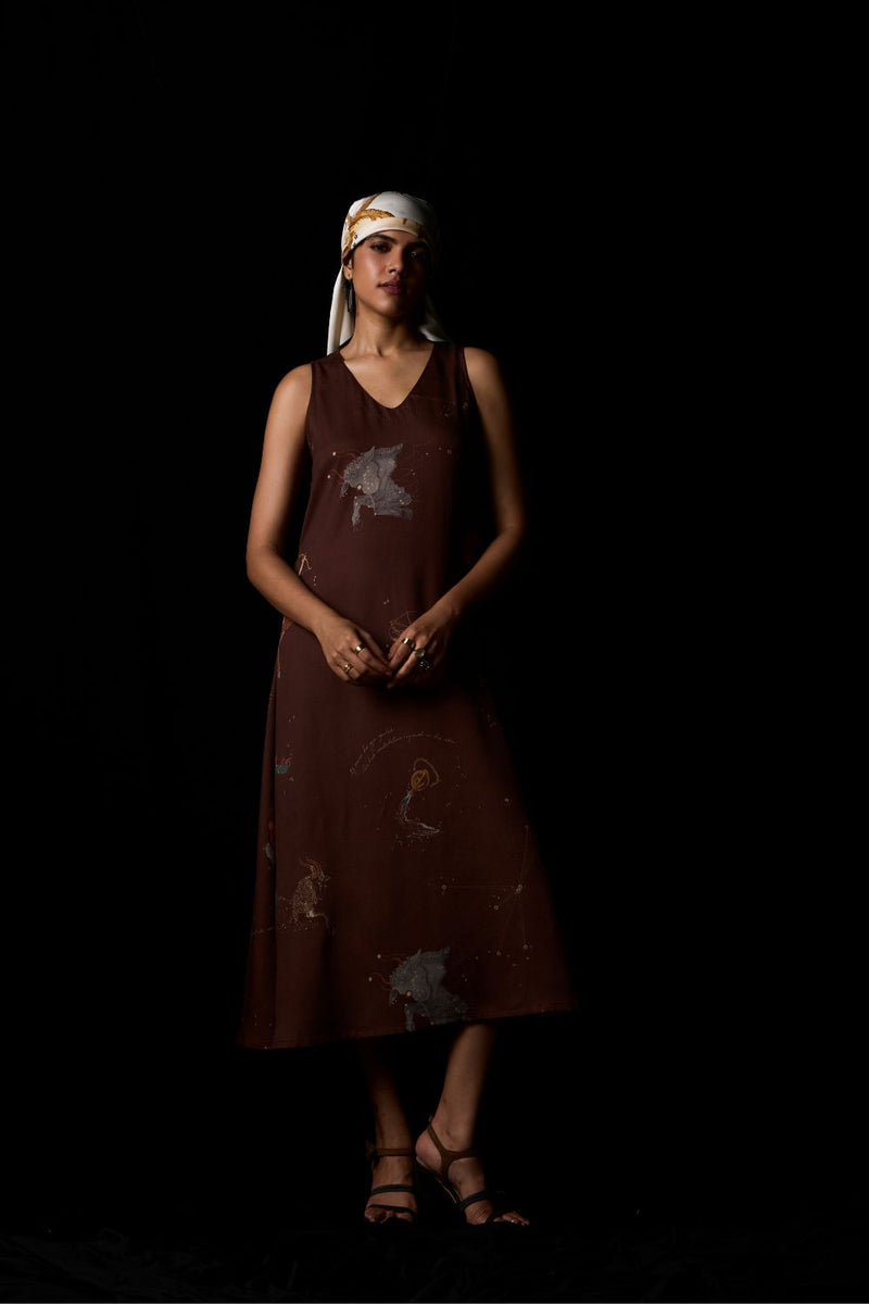 Saira Brown Zodiac Print Maxi Dress by The Summer House in brown color for women in Singapore