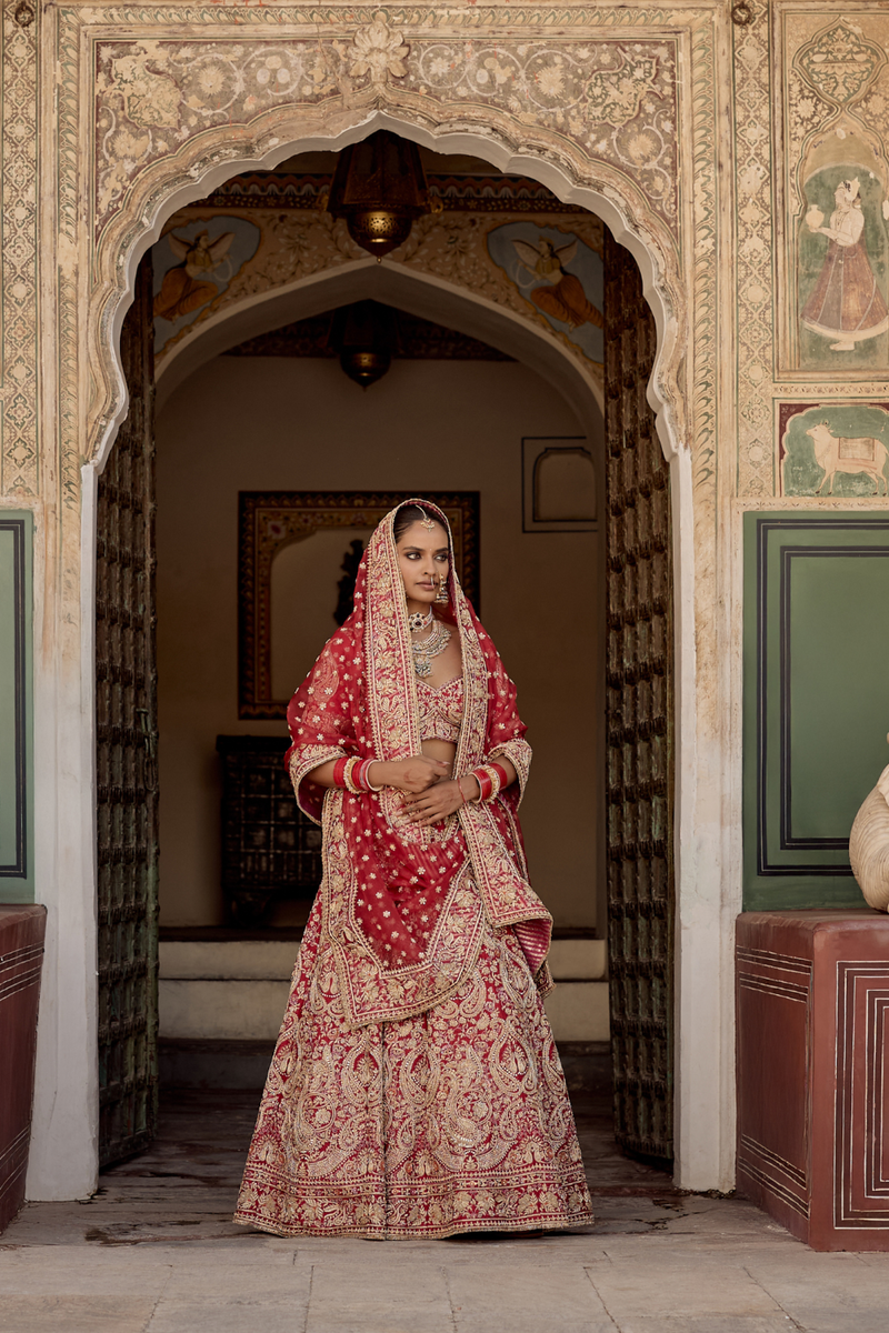 Sanaa - Dabka Zardozi Embroidered Raw Silk Red Bridal Lehenga Set silk by SHEETAL BATRA in red color for women in Singapore