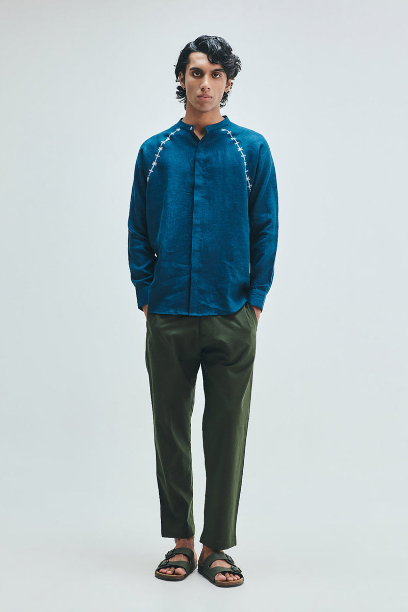 Indigo Linen Embroidered Men’s Raglan Shirt linen shirt by Saphed Men in blue for men in Singapore