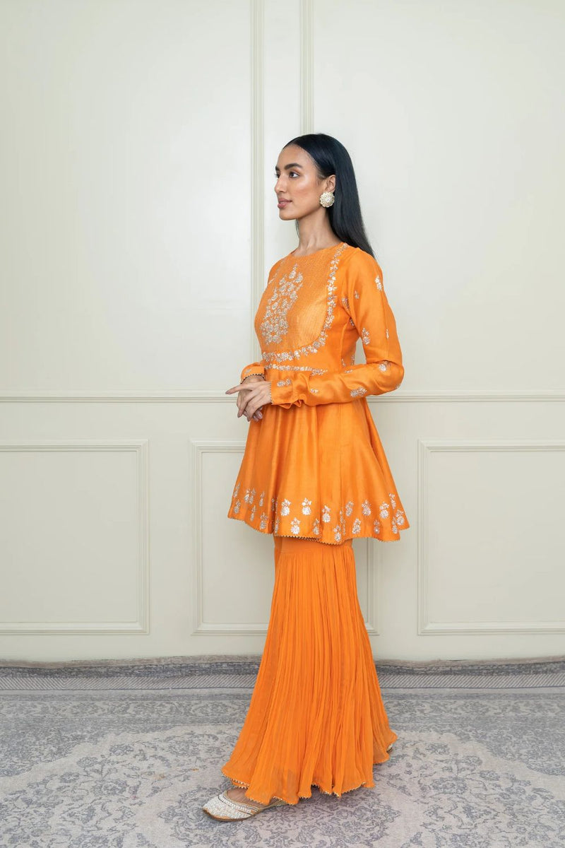 Shahana Peplum kurta with garara and dupatta-Pumpkin orange & scarlet red silk by SHEETAL BATRA in orange color for women in Singapore