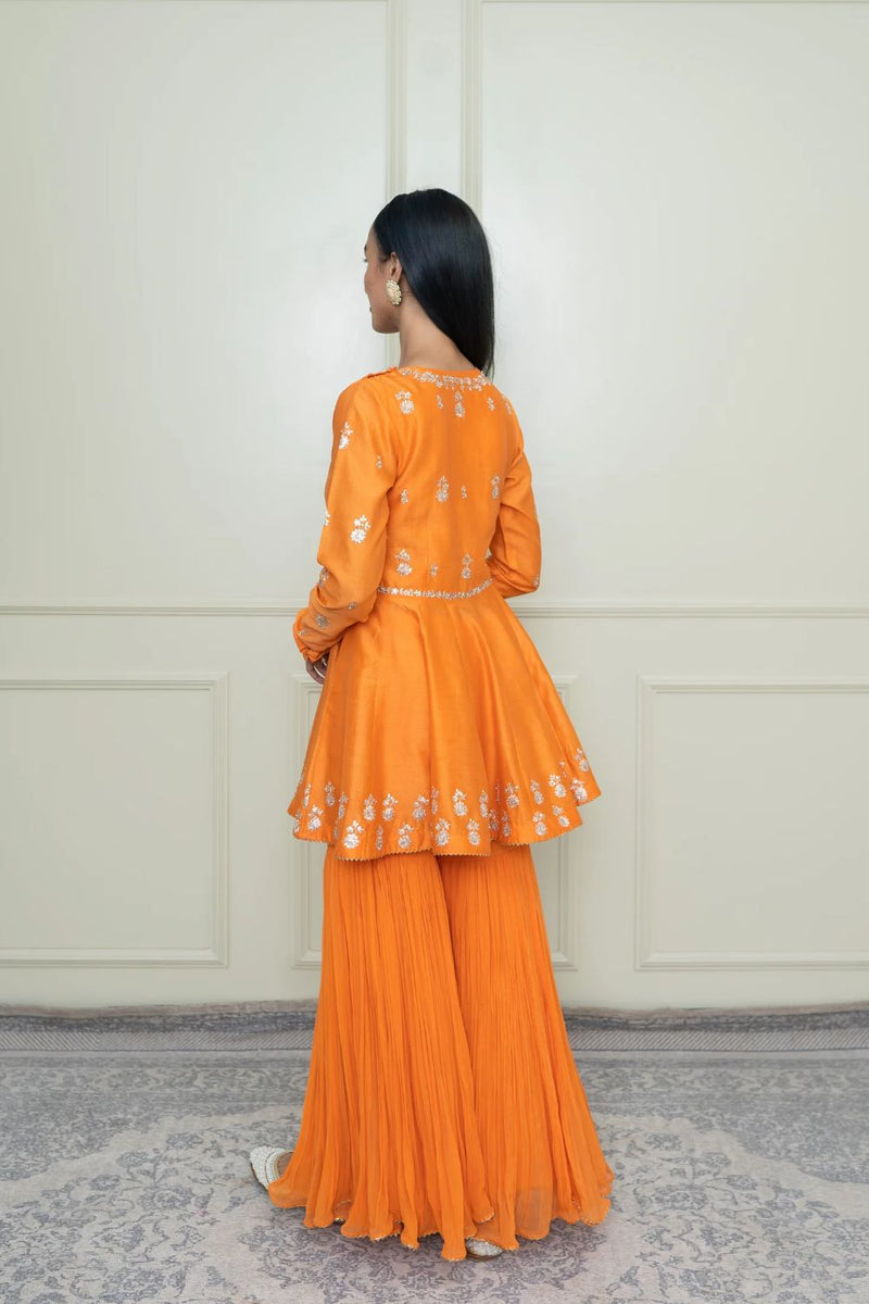 Shahana Peplum kurta with garara and dupatta-Pumpkin orange & scarlet red silk by SHEETAL BATRA in orange color for women in Singapore
