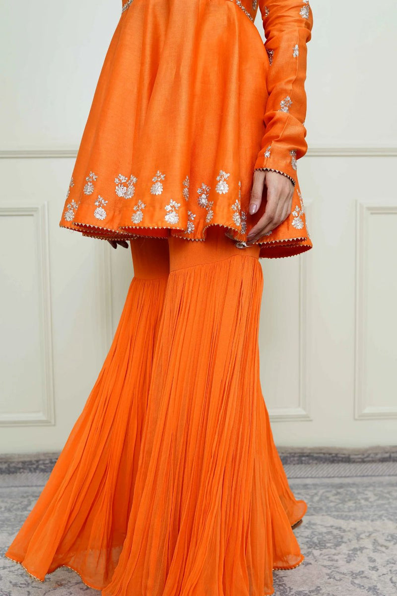 Shahana Peplum kurta with garara and dupatta-Pumpkin orange & scarlet red silk by SHEETAL BATRA in orange color for women in Singapore