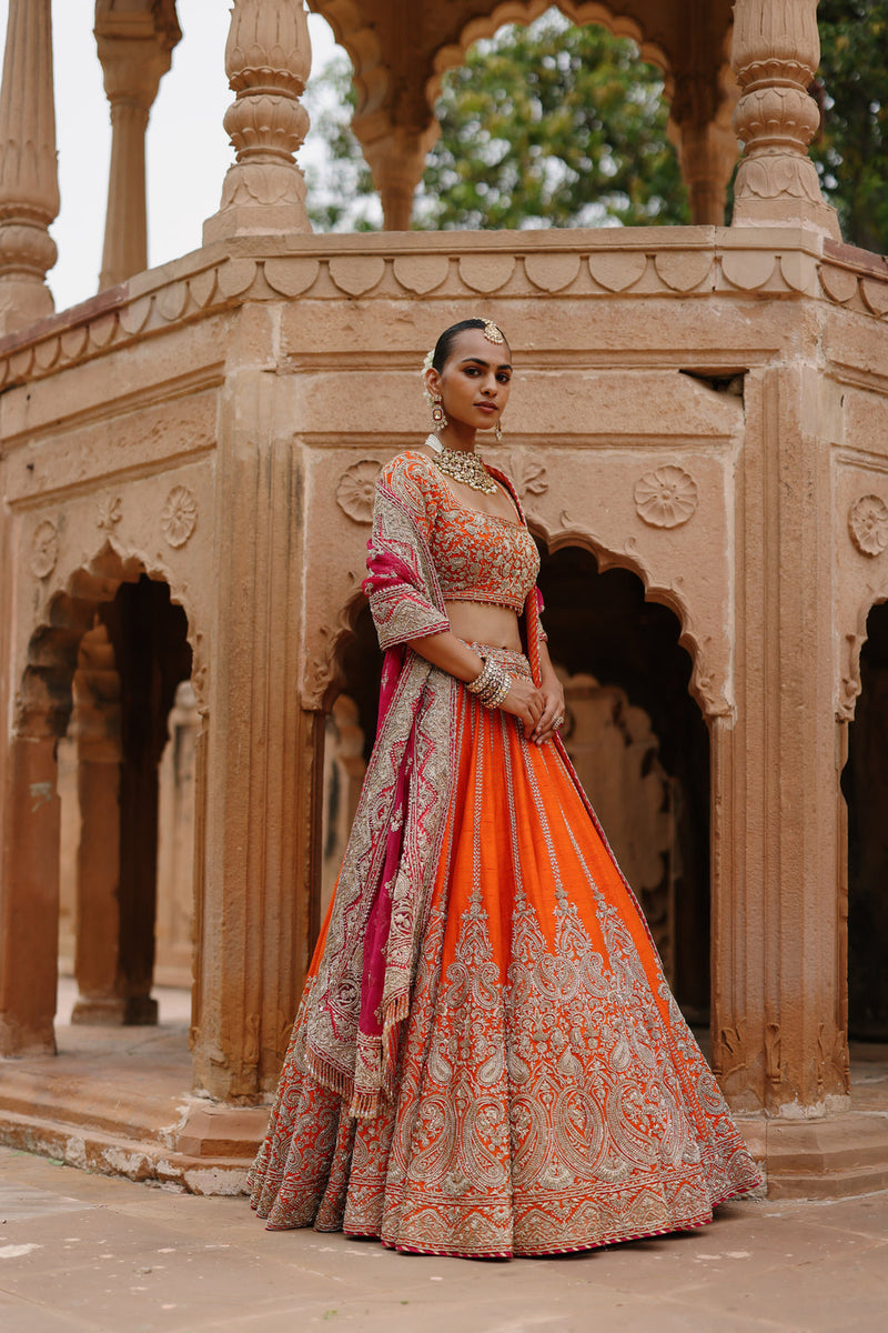 Nagma-Orange Lehenga Set With Blouse And Hot Pink Dupatta raw silk lehenga sets by SHEETAL BATRA in orange, pink for women in Singapore