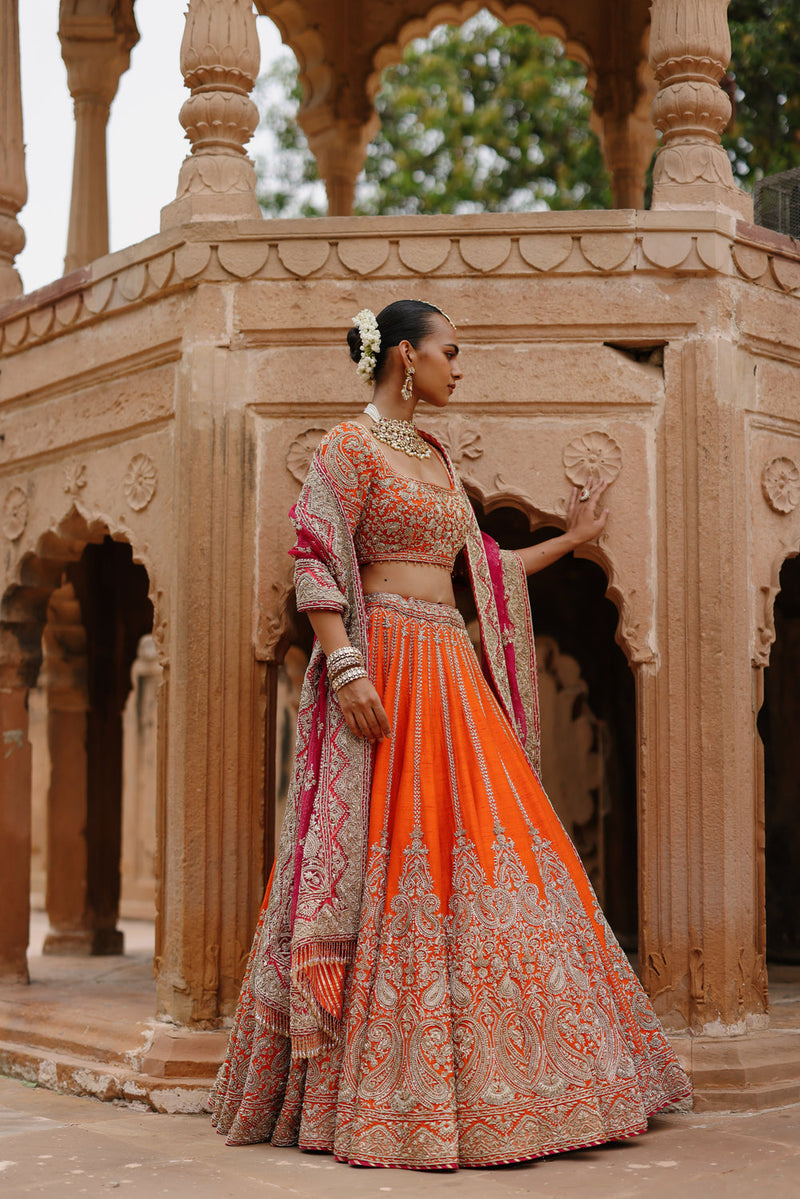 Nagma-Orange Lehenga Set With Blouse And Hot Pink Dupatta raw silk lehenga sets by SHEETAL BATRA in orange, pink for women in Singapore