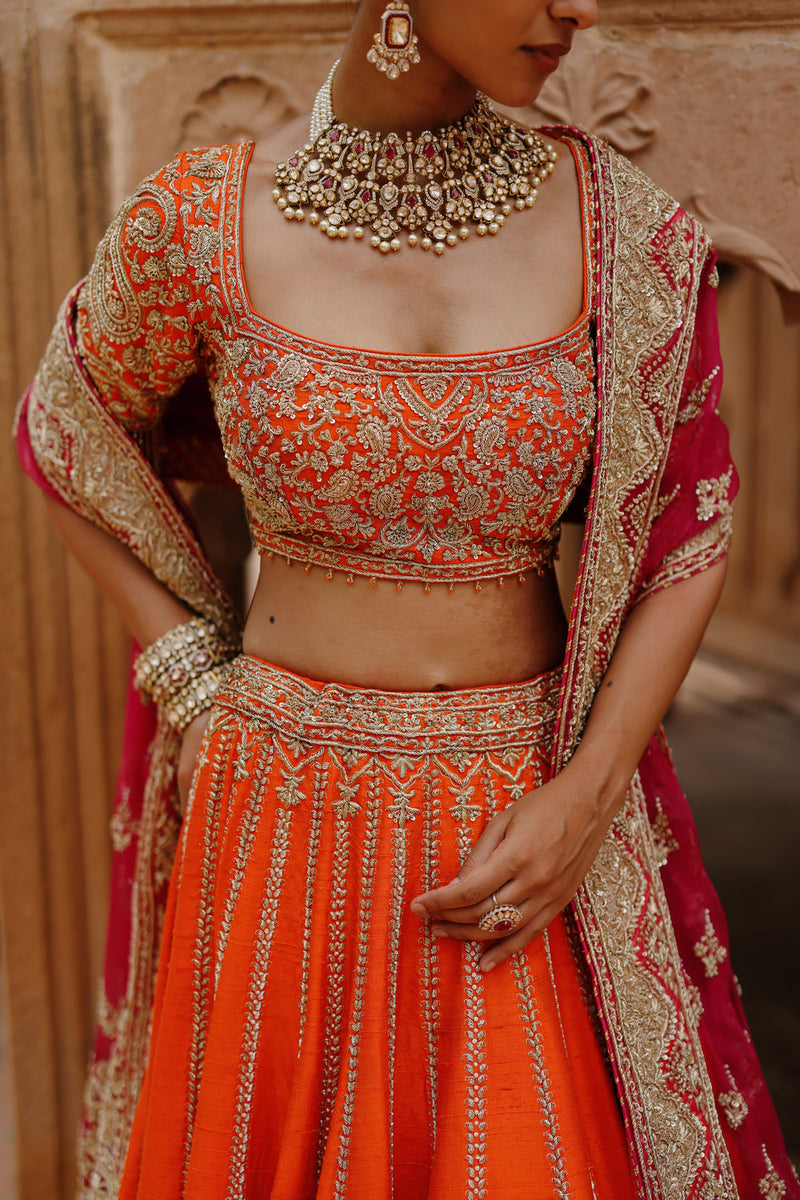 Nagma-Orange Lehenga Set With Blouse And Hot Pink Dupatta raw silk lehenga sets by SHEETAL BATRA in orange, pink for women in Singapore