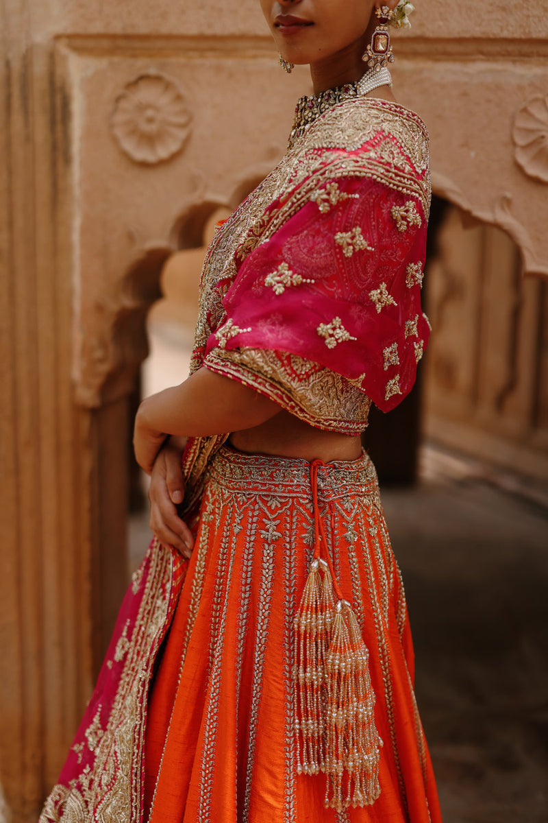 Nagma-Orange Lehenga Set With Blouse And Hot Pink Dupatta raw silk lehenga sets by SHEETAL BATRA in orange, pink for women in Singapore