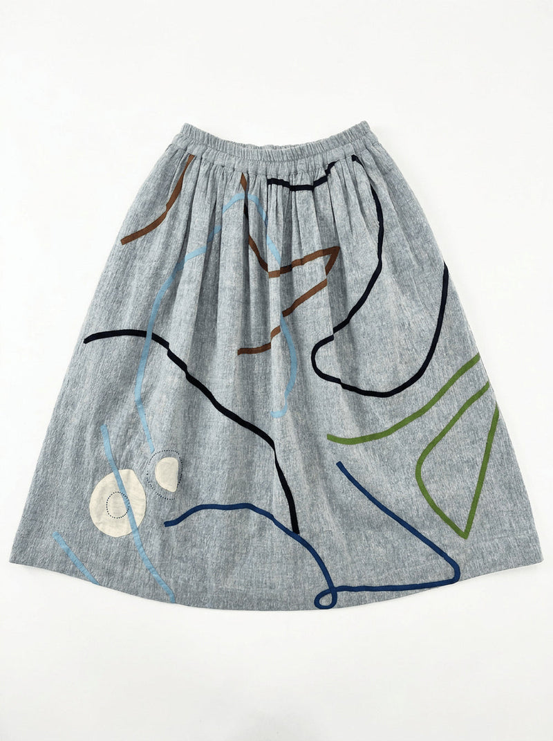 The Crayon Joy Skirt handwoven organic chambray cotton skirt by World of Crow in light blue indigo for women in Singapore