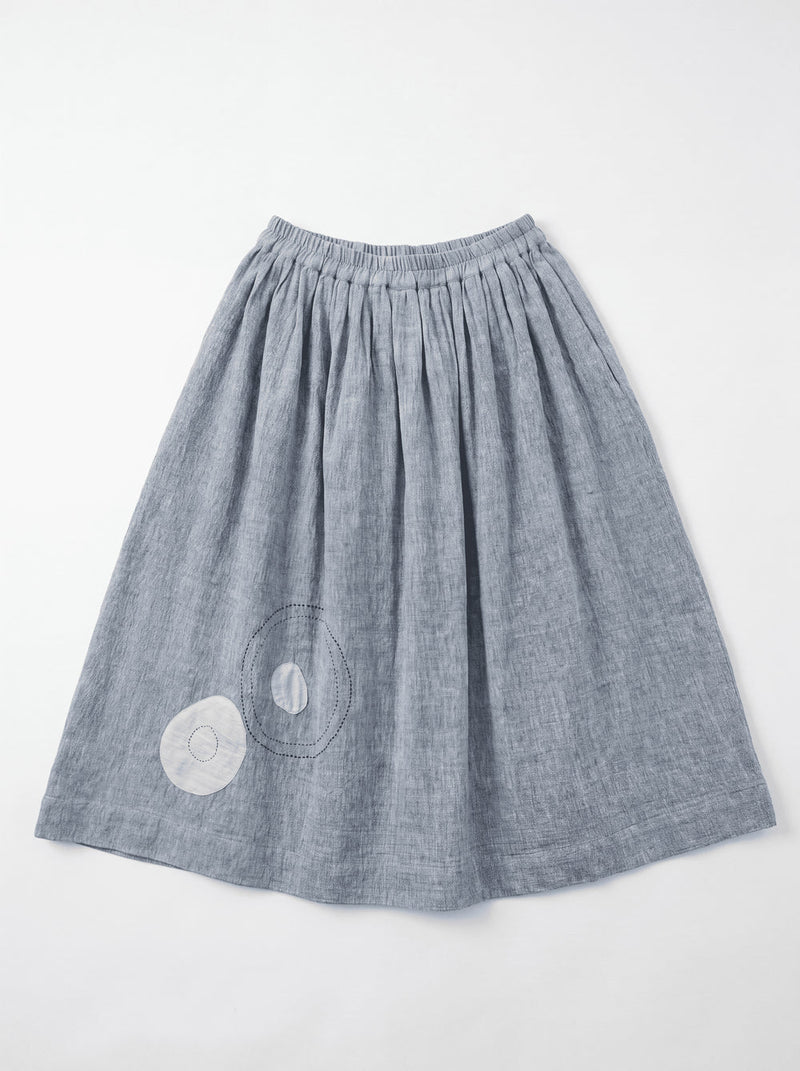 The Crayon Joy Skirt handwoven organic chambray cotton skirt by World of Crow in light blue indigo for women in Singapore