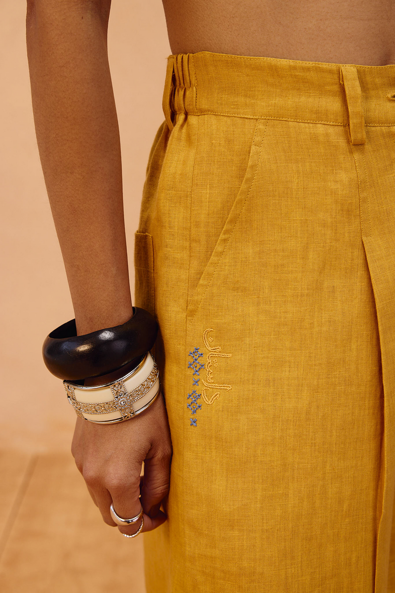 The Golden Linen Shorts 100% linen short by SUI in mustard for women in Singapore