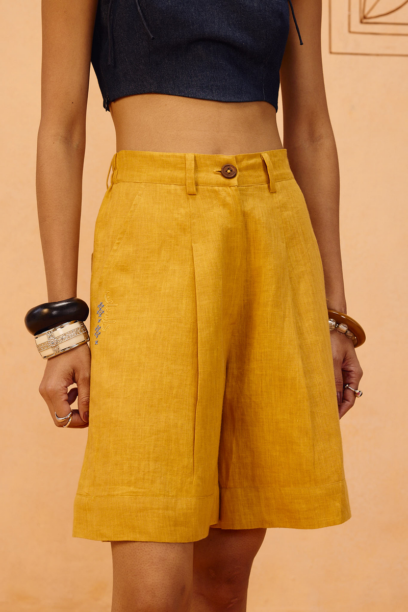 The Golden Linen Shorts 100% linen short by SUI in mustard for women in Singapore