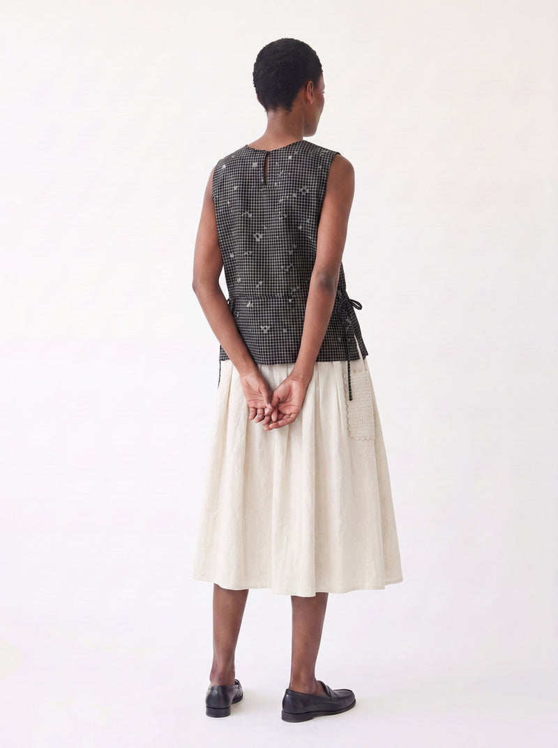 The Pleated Artisan Skirt-Basket Patchwork cotton muslin skirt by World of Crow in white for women in Singapore
