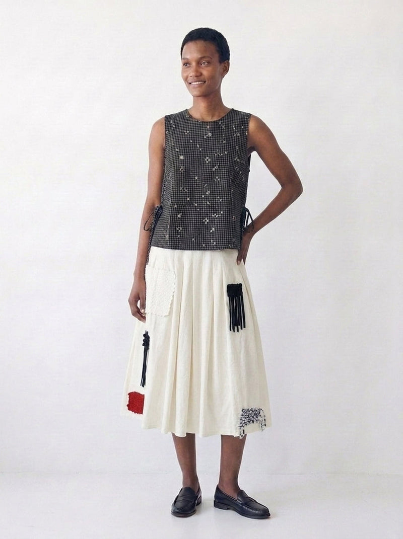 The Pleated Artisan Skirt-Basket Patchwork cotton muslin skirt by World of Crow in white for women in Singapore