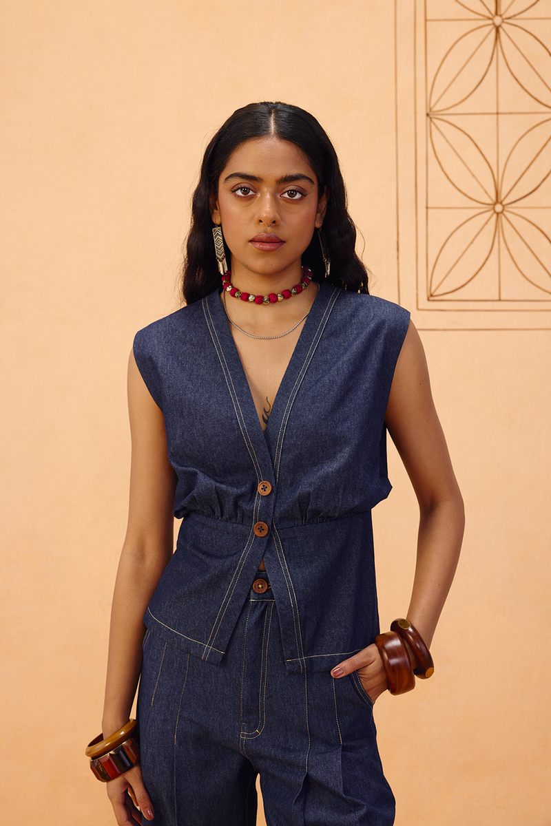 The Timeless Sustainable Denim Waistcoat denim jacket/overlay by SUI in blue for women in Singapore