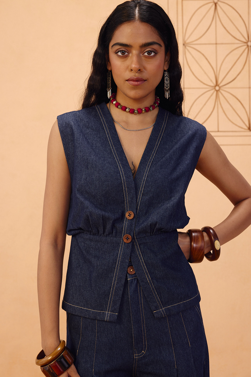The Timeless Sustainable Denim Waistcoat denim jacket/overlay by SUI in blue for women in Singapore