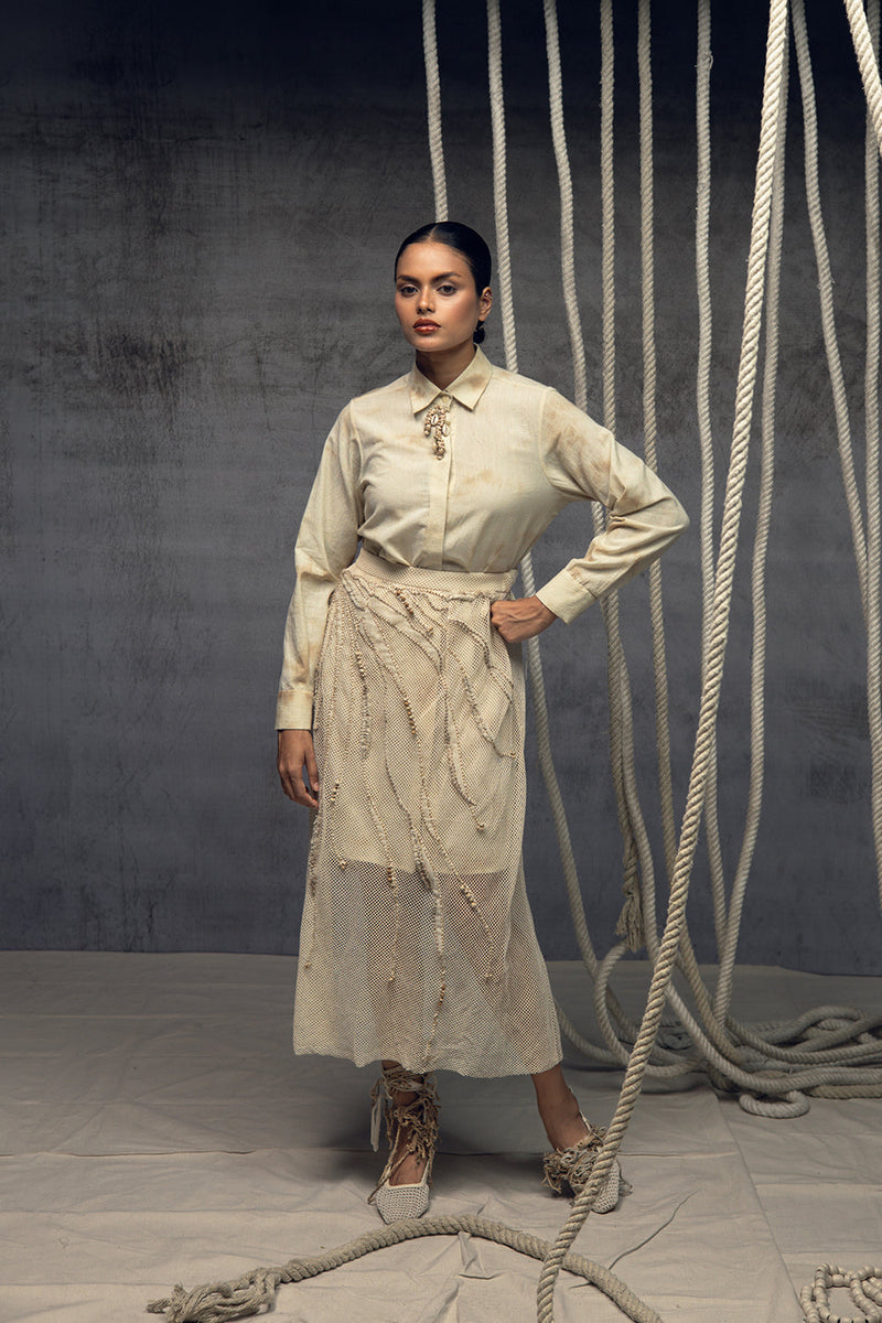 Open Mesh Embroidered Overlay Skirt cotton open mesh skirt by Kritika Murarka in ivory for women in Singapore