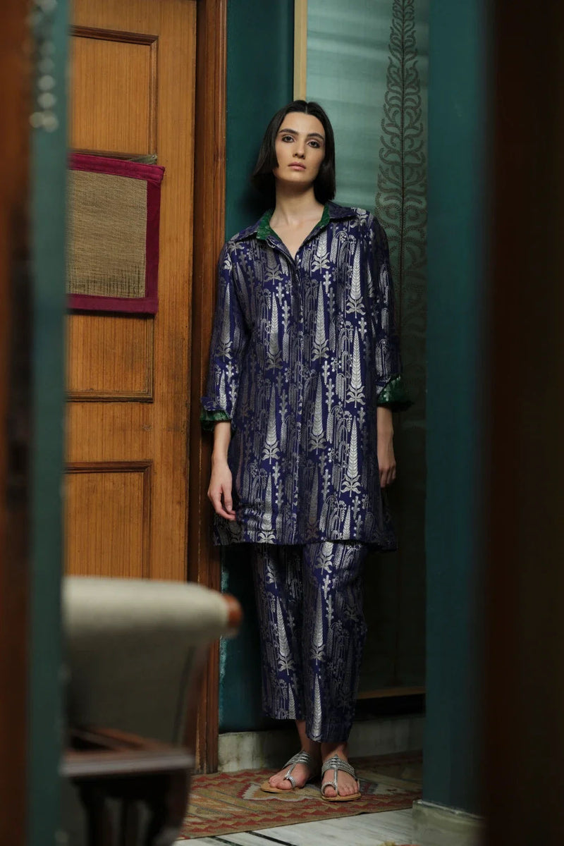 Vriksha' collared tunic and slim pants munga silk munga silk kurta/kurta set by Malika Mathur in purple for women in Singapore