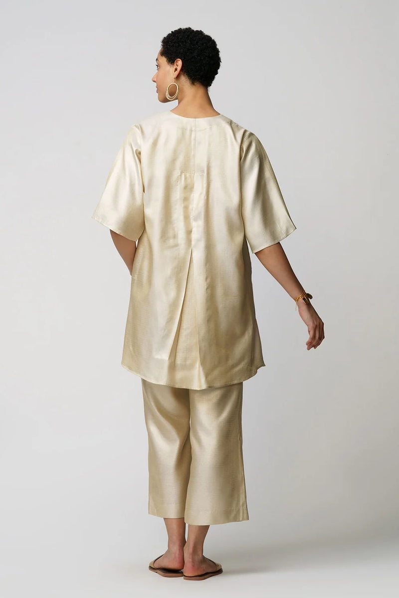 Xylia' wild peony flower bloom applique gold zari short and long tunic set zari kurta/kurta set by Malika Mathur in gold for women in Singapore