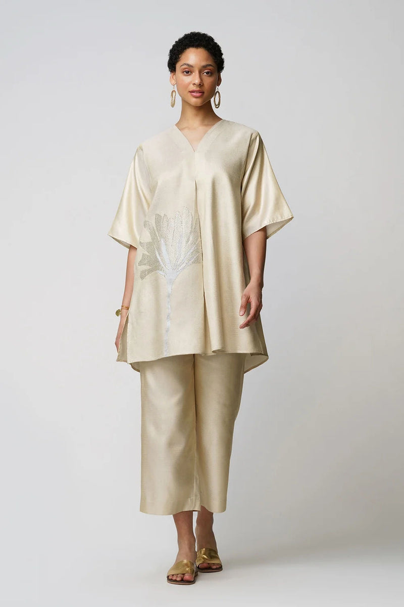 Xylia' wild peony flower bloom applique gold zari short and long tunic set zari kurta/kurta set by Malika Mathur in gold for women in Singapore