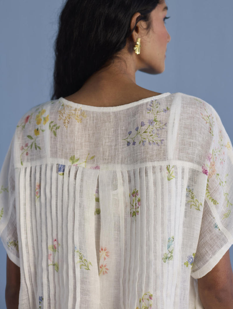 Uniko Pleated Floral Linen Dress - White linen by Manan in white color for women in Singapore