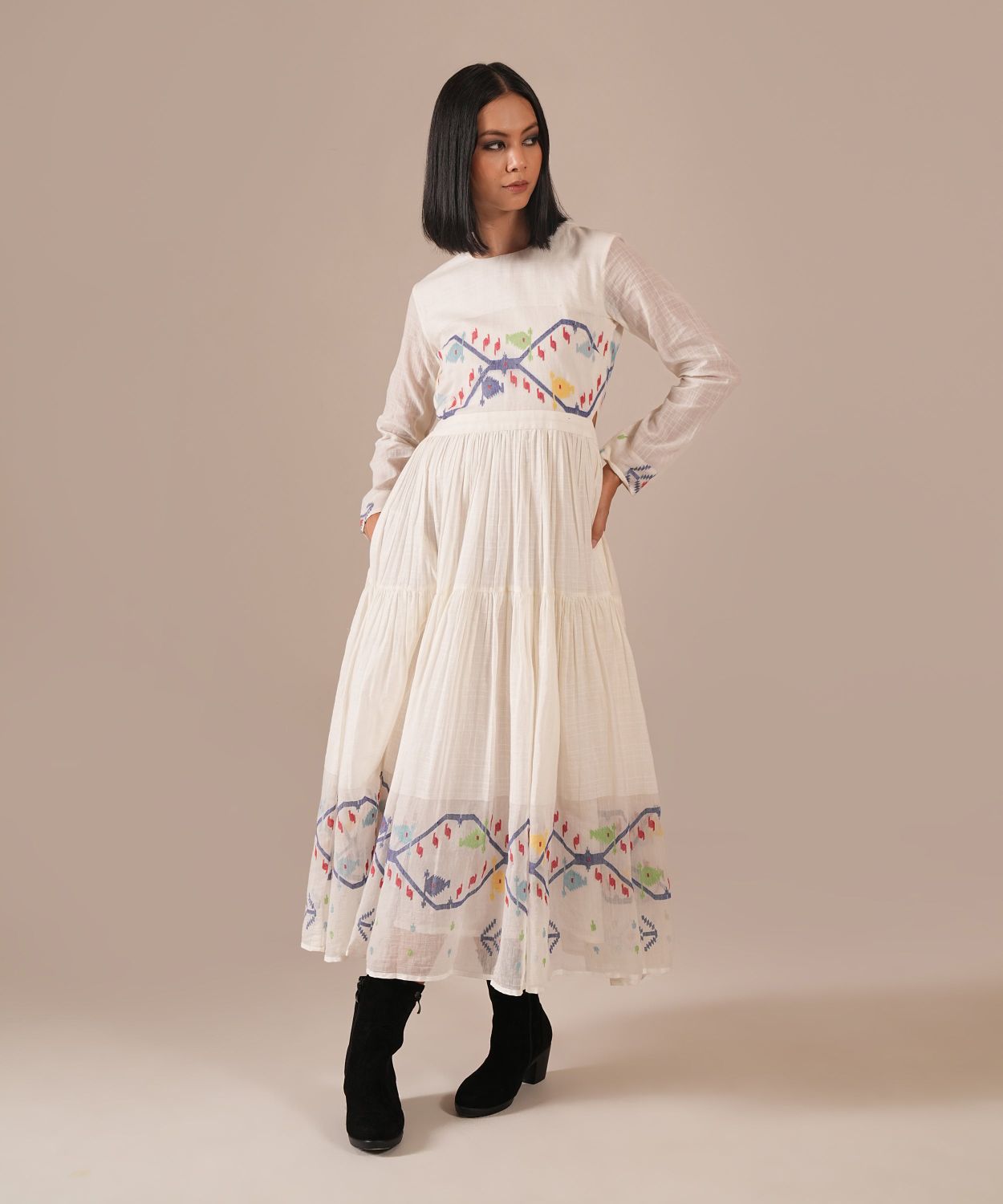 Indigo Dreams Frosted Petal white Jamdani dress with fitted bodice, waist cut-out and tiered silhouette