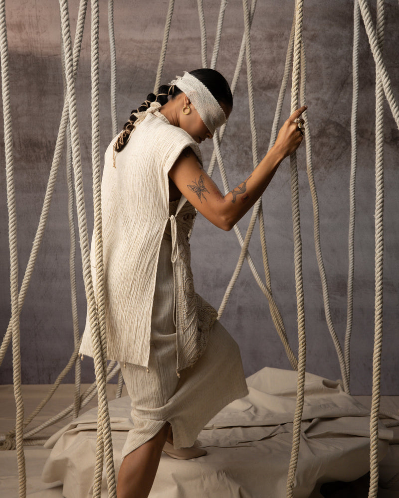 Ivory Cord Embroidered Side-Tie Bib crushed cotton jacket/overlay by Kritika Murarka in ivory for women in Singapore