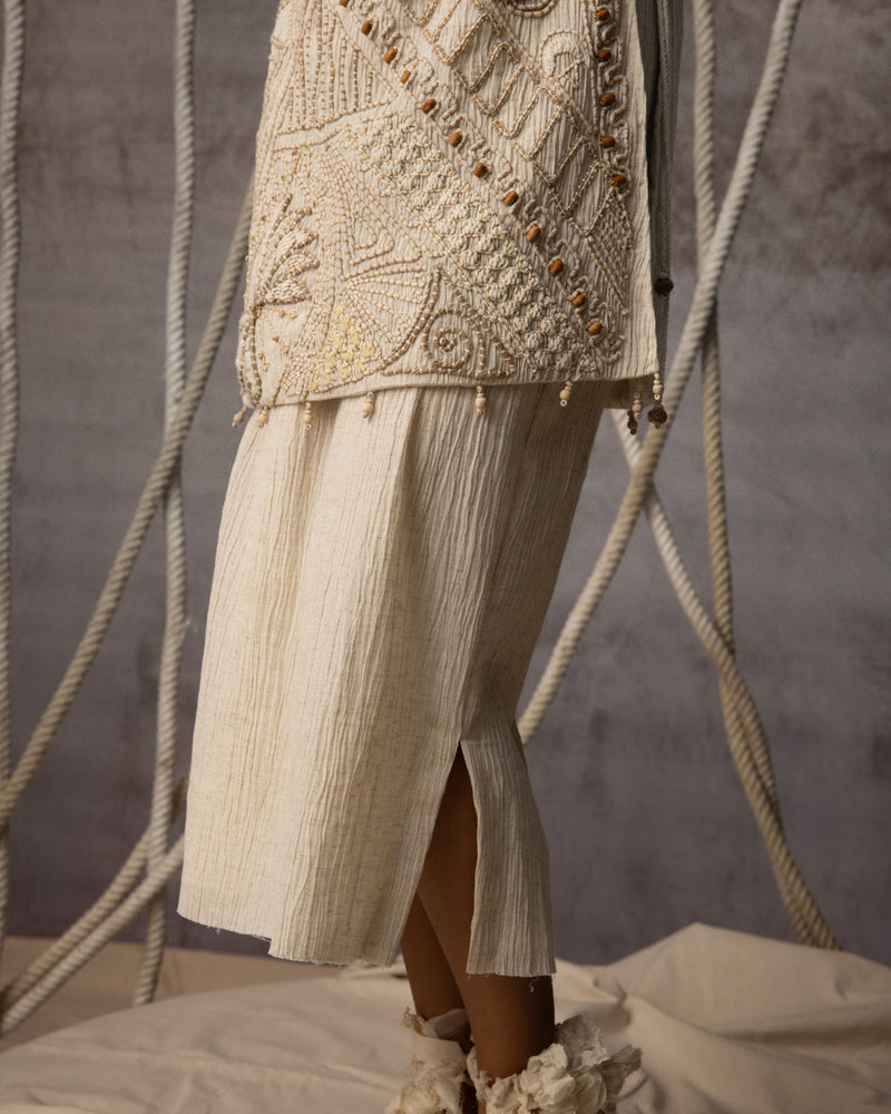Ivory Cord Embroidered Side-Tie Bib crushed cotton jacket/overlay by Kritika Murarka in ivory for women in Singapore
