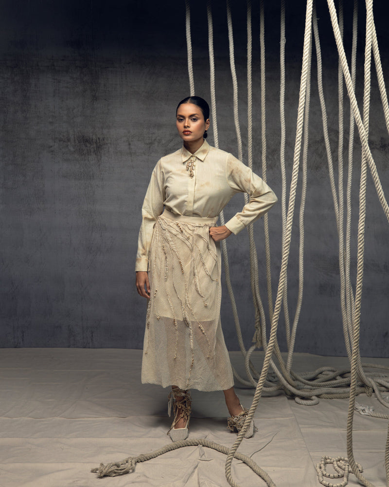 Open Mesh Embroidered Overlay Skirt cotton open mesh skirt by Kritika Murarka in ivory for women in Singapore