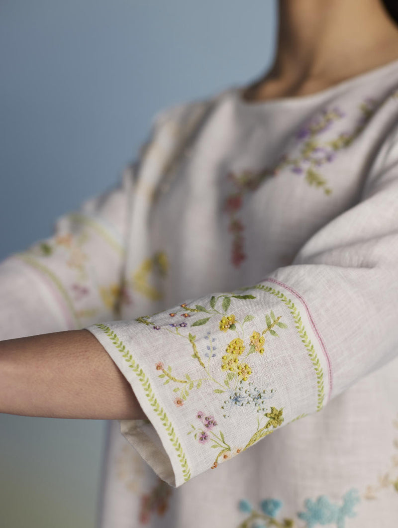Emra Hand-Embroidered Linen Kurta - White linen by Manan in white color for women in Singapore