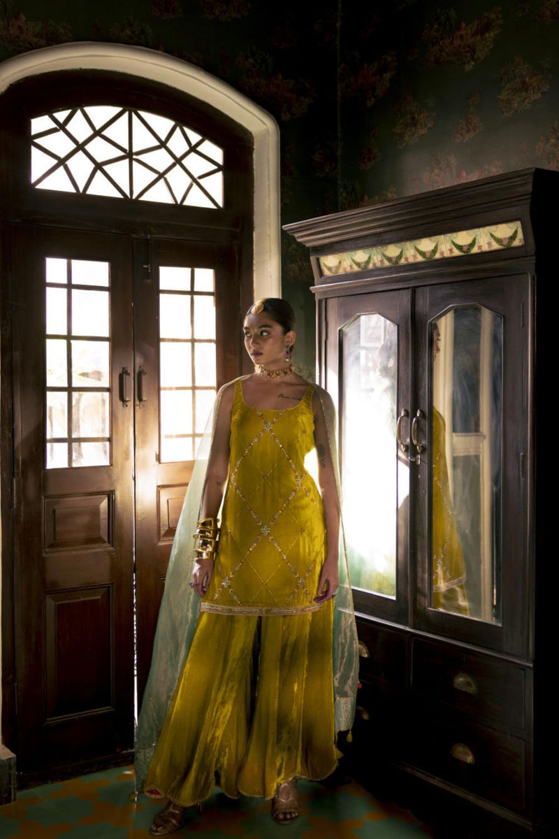Fariba Yellow Silk Velvet Sharara Set Kurta Sets by Rajiramniq for women in Singapore