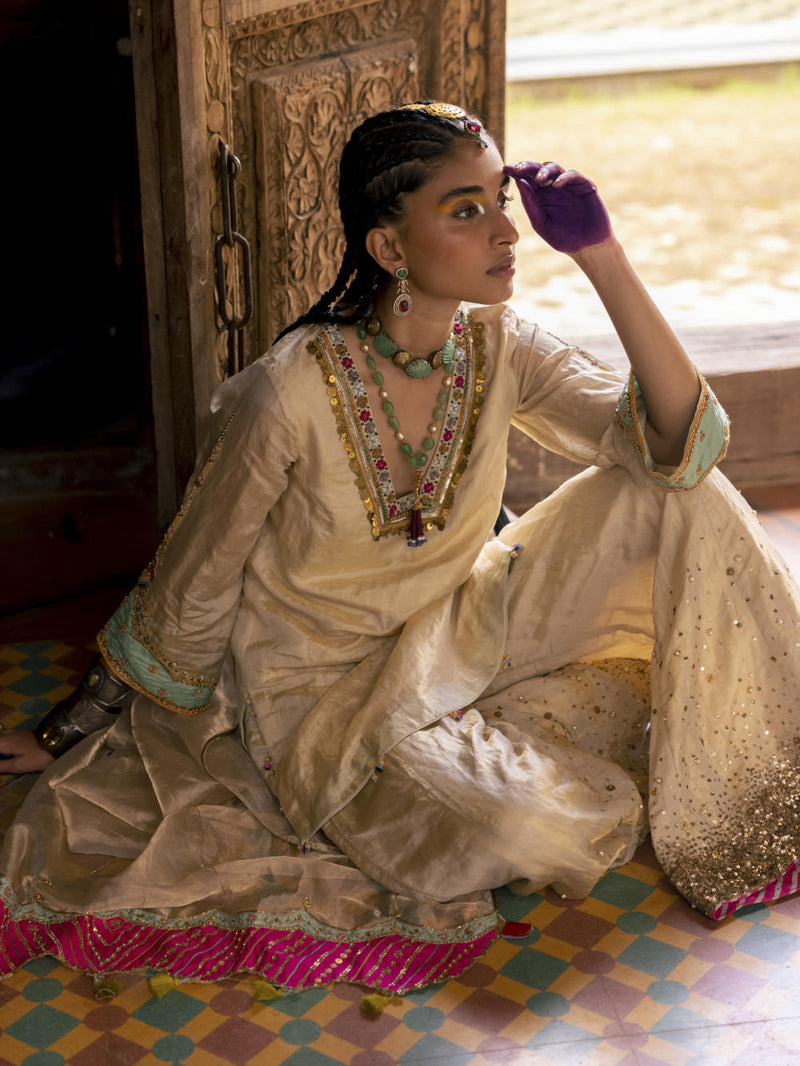 Fariba Ivory Golden Tissue Sharara Set Kurta Sets by Rajiramniq for women in Singapore