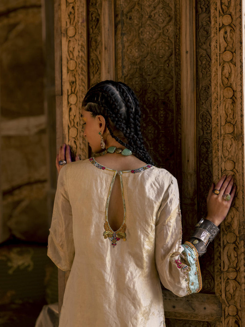 Fariba Ivory Golden Tissue Sharara Set Kurta Sets by Rajiramniq for women in Singapore