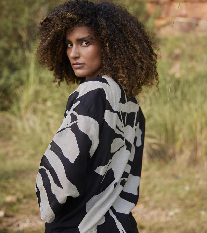 Dazed Trance Top Top & Tunics by Khara Kapas in black for women in Singapore