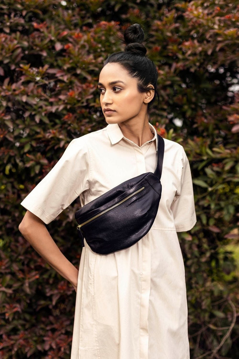 Black fanny pack by Khara Kapas for women in Singapore