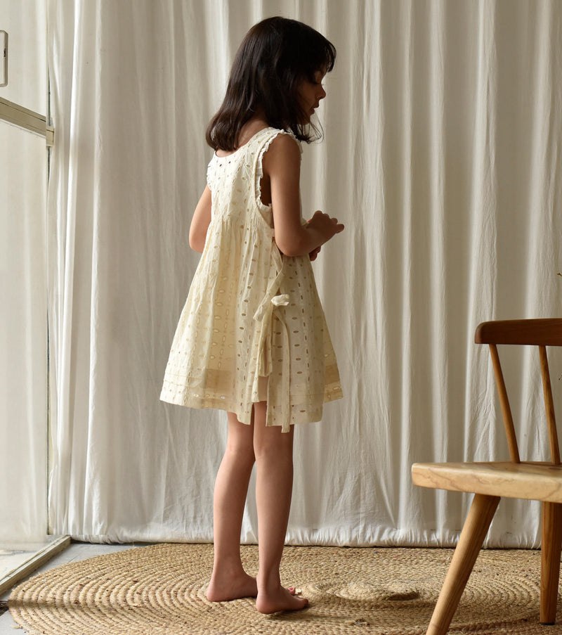 Egg-shell Apron Frock Dress by Khara Kapas Kids for kids in Singapore